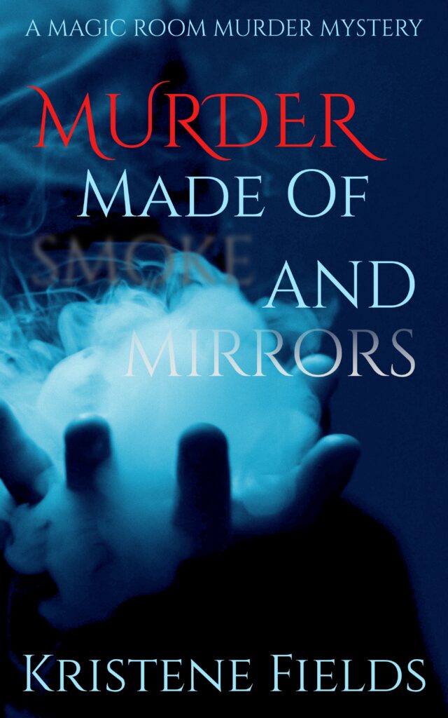 A book cover titled "Murder Made of Smoke and Mirrors" by Kristene Fields, and stated as a "Magic Room Murder Mystery". The cover features a cloaked figure in the background and their hand on the foreground holding a ball of blue smoke. The text "Murder" is in a red font, the text "Smoke" is dark gray and opaque, and the text "Mirrors" is in a reflective silver gradient. The tone is mysterious and intriguing.